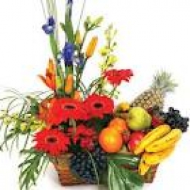 Fresh Fruits With Exotic Flowers In A Basket